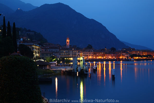 Menaggio night lights in Lake Como blue waterscape romantic city under mount skyline mood