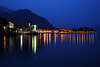 Lake Como night lights of Menaggio city skyline under mount blue waterscape romantic image twilight