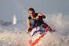 Jetski speeddrive picture dynamic tour on water, jet-ski waterscooter at lake action portrait