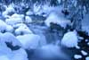 Snow over water brook winter-magic nature blue-white colors