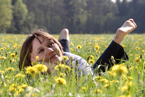 Girl barefoot in bloom-field spring-feelings photo relaxen outside dreams on meadow yellow blooming flowers