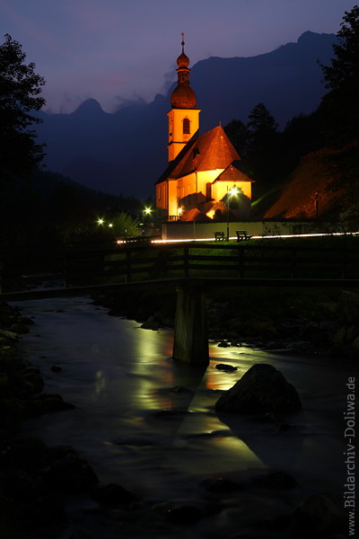 Ramsau church nightly romantic lights mood at river bridge