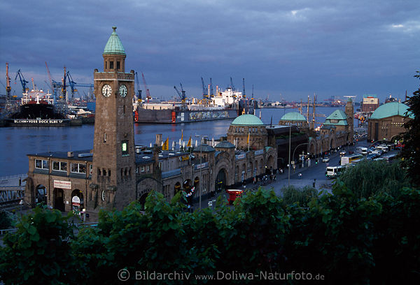 Hamburg harbor dawn after sunrise twilight over port cranes at Elba-river shipyard photo